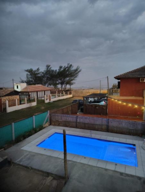 Casa Beira da praia com piscina